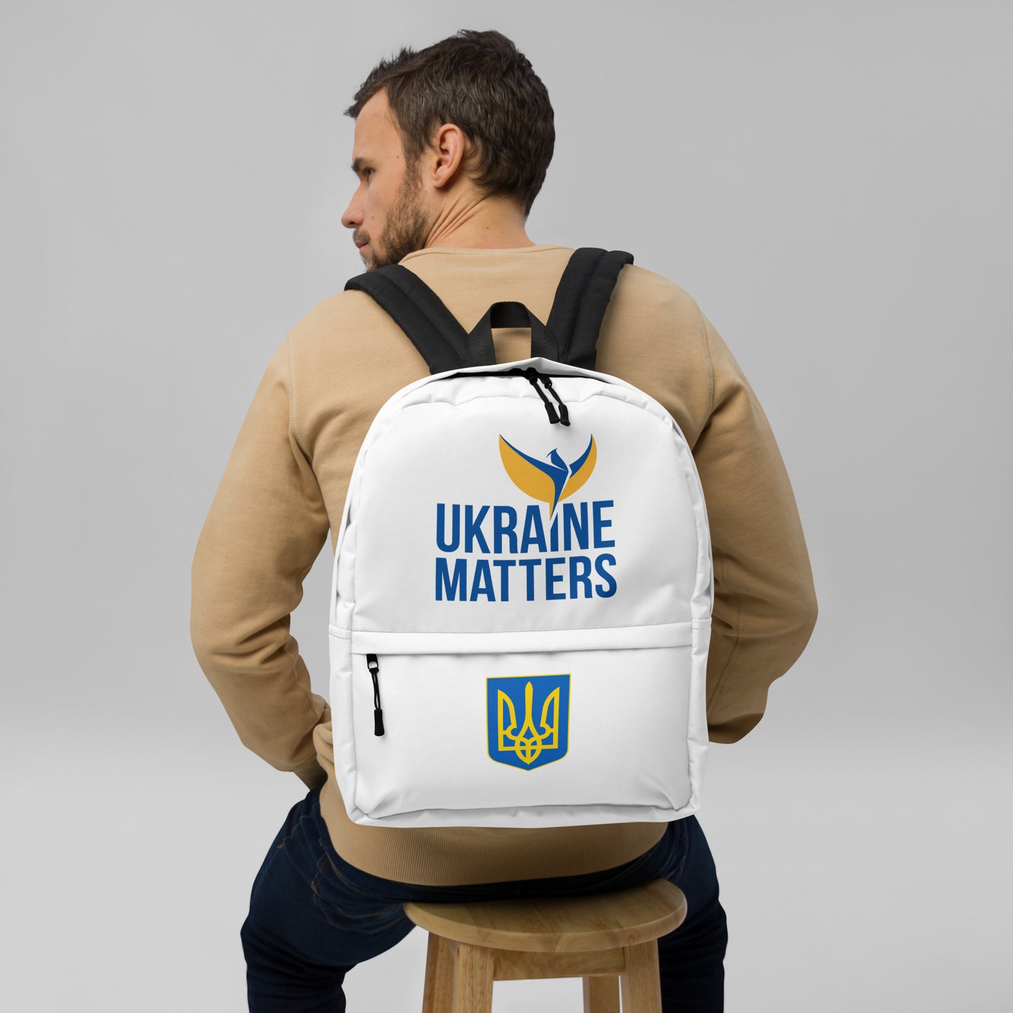 White Backpack - Ukraine Matters Logo