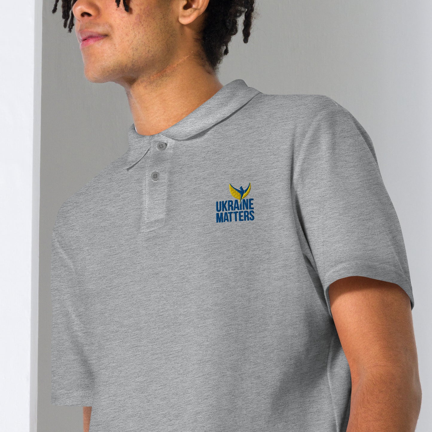 Unisex Polo Shirt - Embroidered Ukraine Matters Logo